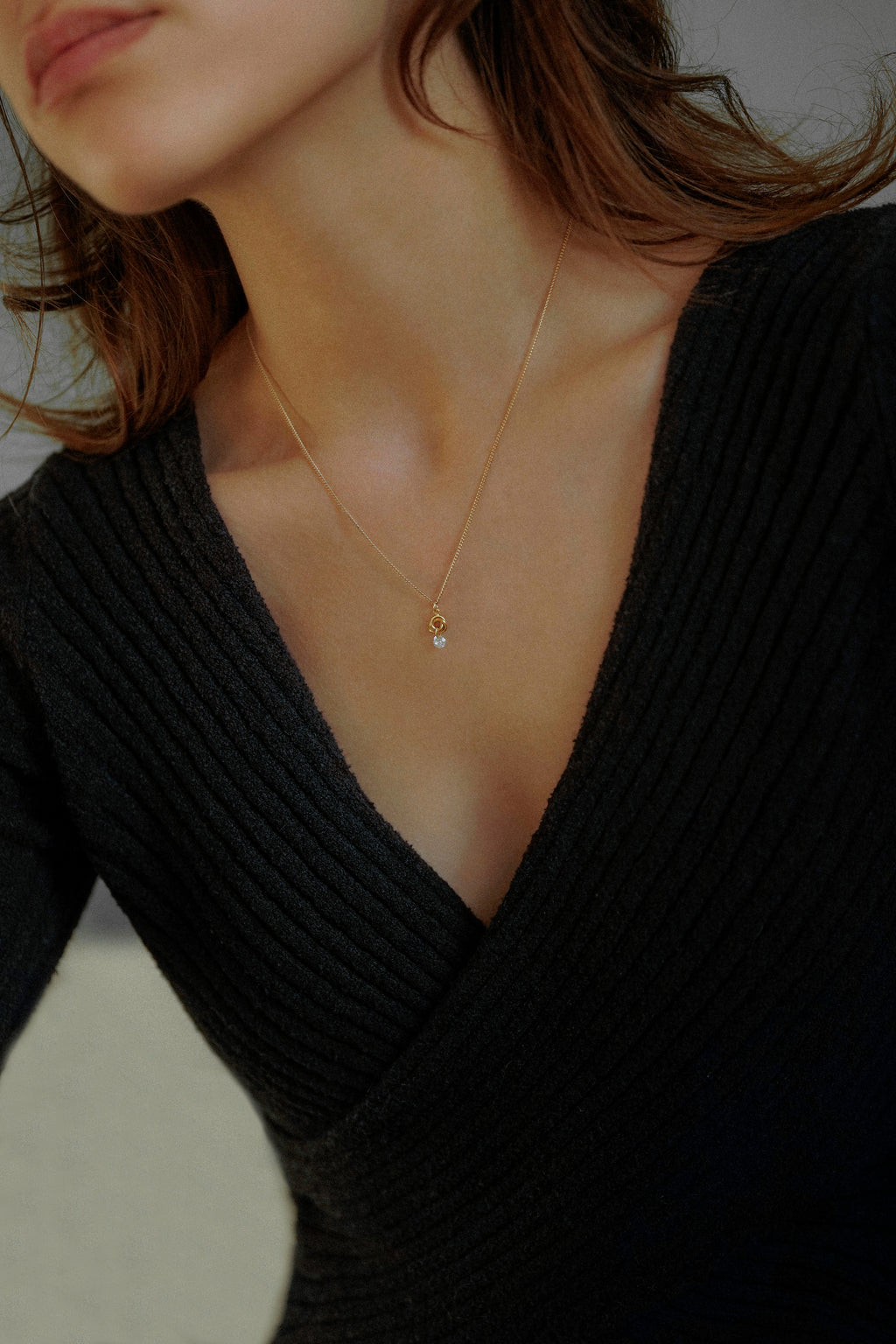 Cubic Zirconia Love Knot Charm Necklace